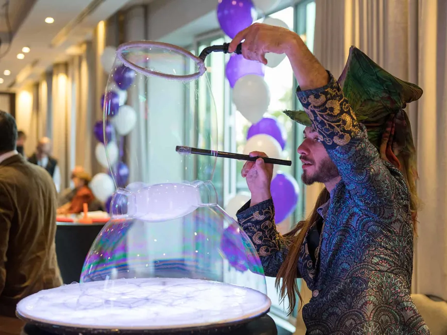 Magician blowing bubbles